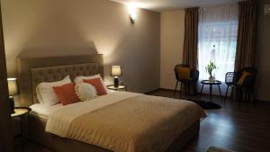 Ένα ή περισσότερα κρεβάτια σε δωμάτιο στο Villa Manevi +42 φωτογραφίες