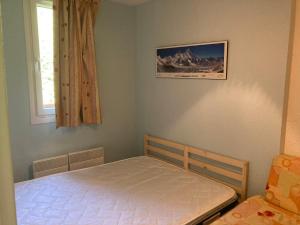Posteľ alebo postele v izbe v ubytovaní Le Pleynet: 2P Cabine, 30m², 6 pers, à 300m des pistes, balcon, ascenseur - FR-1-557A-49