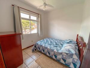 Cama o camas de una habitación en Casa de Praia Pinheira