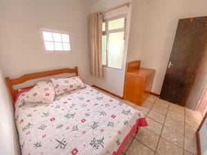 Cama o camas de una habitación en Casa de Praia Pinheira