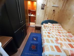 Postel nebo postele na pokoji v ubytování Apartman Fantazija