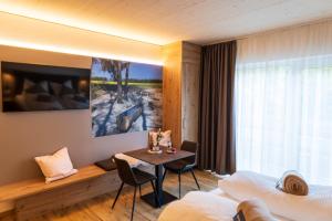 Postel nebo postele na pokoji v ubytování DAS GEORG Gästehaus in Epfendorf