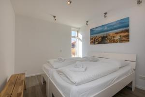 Ένα ή περισσότερα κρεβάτια σε δωμάτιο στο Welcome in - Oostkapelseweg 32, Serooskerke 'Ooievaar'