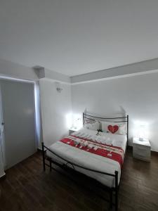 Postel nebo postele na pokoji v ubytování Curti Granda