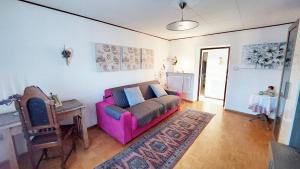 Posedenie v ubytovaní Le Rondini di Casa Bernardi, sole e natura sulle Dolomiti Wi-Fi PetFriendly