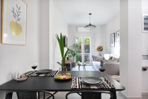 A seating area at apt Eleven - cozy apartment with garden