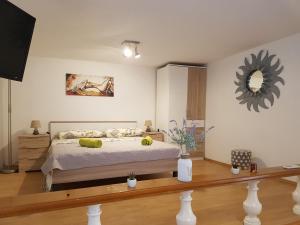 Ένα ή περισσότερα κρεβάτια σε δωμάτιο στο Studio apartman
