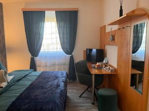 Łóżko lub łóżka w pokoju w obiekcie Frühstückspension Elena Nicoleta Caltun