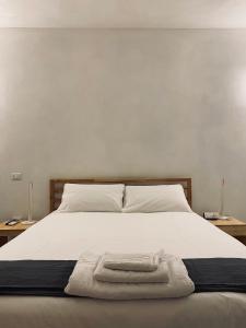 Postel nebo postele na pokoji v ubytování Olea b&b