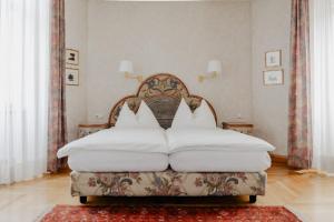 Giường trong phòng chung tại Hotel Hammer