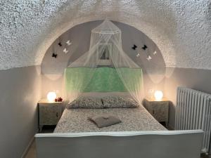 A bed or beds in a room at Casa Cristina - Vista Lago