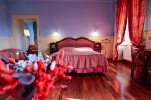 Postel nebo postele na pokoji v ubytování Hotel Corte dei Tini
