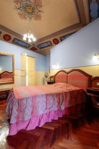 Postel nebo postele na pokoji v ubytování Hotel Corte dei Tini
