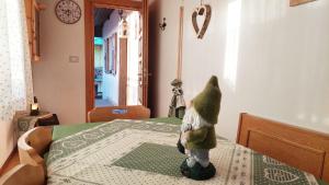 Posteľ alebo postele v izbe v ubytovaní Le Rondini di Casa Bernardi, sole e natura sulle Dolomiti Wi-Fi PetFriendly