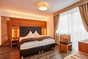 Posteľ alebo postele v izbe v ubytovaní Hotel Astoria + 37 fotografií