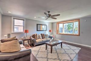 a living room with two couches and a ceiling fan at Family-Friendly Getaway 11 Mi to Dtwn Philly in Philadelphia