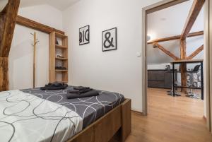 Posteľ alebo postele v izbe v ubytovaní LTE Apartments