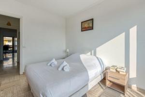 Un ou plusieurs lits dans un hébergement de l'établissement Nice flat with terrace and parking at the heart of Cagnes-sur-Mer - Welkeys