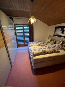 Postel nebo postele na pokoji v ubytování Haus Knauß