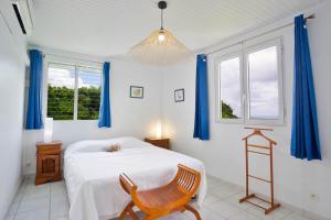 Una cama o camas en una habitación de Résidence La Clément