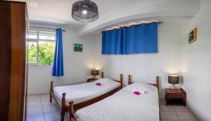 Una cama o camas en una habitación de Résidence La Clément