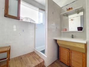 a bathroom with a shower and a sink and a window at Chalet familial à St Marcel avec terrasse, 6 pers, 3 chambres - FR-1-344-1051 in Saint-Marcel +9 photos