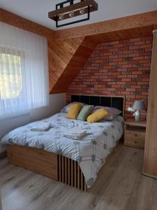 Posteľ alebo postele v izbe v ubytovaní Apartament 6 osobowy Pasternik