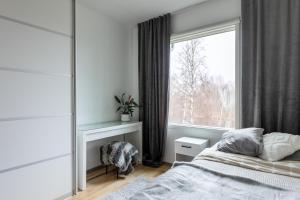 Postel nebo postele na pokoji v ubytování Villa Mommo