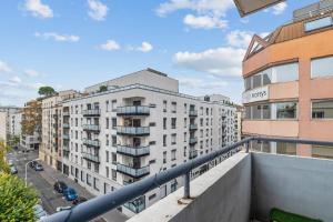 een uitzicht vanaf het balkon van een gebouw bij Beautiful flat nearby Part-Dieu in Lyon - Welkeys in Lyon