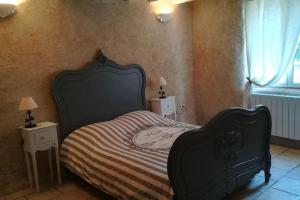 Posteľ alebo postele v izbe v ubytovaní Gîte 16 personnes(Zoo La Flèche, 24h du Mans)