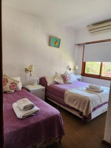 Una cama o camas en una habitación de Hotel Barracuda