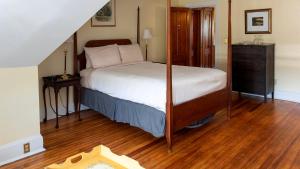 Postel nebo postele na pokoji v ubytování William Henry Miller Inn