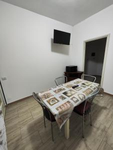 Televízia a/alebo spoločenská miestnosť v ubytovaní Appartamento C&Y Torelli + 21 fotografií