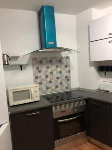 A kitchen or kitchenette at Apartamento rural cerca del centro
