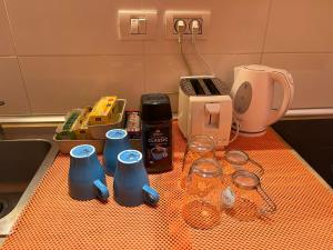 Příslušenství pro přípravu čaje a kávy v ubytování Hostal Paraíso Tenerife