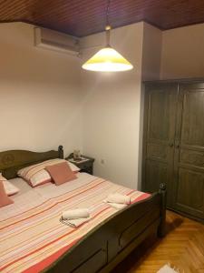 Postel nebo postele na pokoji v ubytování Rooms Juran