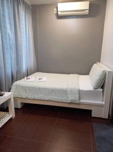 Voodi või voodid majutusasutuse GLC SUITES toas