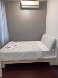 Voodi või voodid majutusasutuse GLC SUITES toas