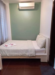 Voodi või voodid majutusasutuse GLC SUITES toas