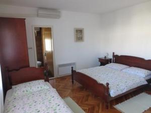 Postel nebo postele na pokoji v ubytování Rooms Juran