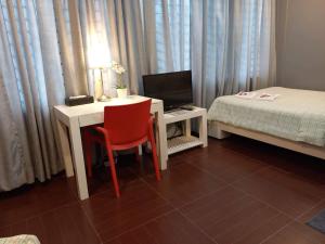 Voodi või voodid majutusasutuse GLC SUITES toas