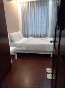 Voodi või voodid majutusasutuse GLC SUITES toas
