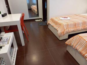Voodi või voodid majutusasutuse GLC SUITES toas