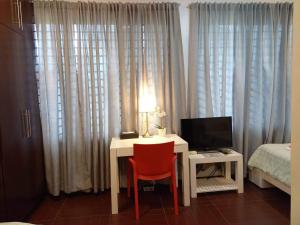 Voodi või voodid majutusasutuse GLC SUITES toas