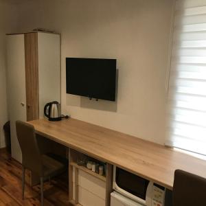 TV a/nebo společenská místnost v ubytování Apartmánový dom Višňové