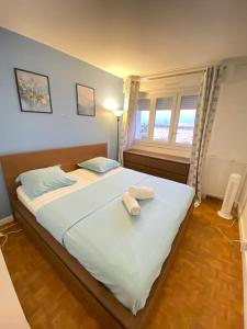 Posteľ alebo postele v izbe v ubytovaní Superbe appartement proche de Paris + 8 fotografií