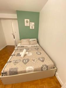 Postel nebo postele na pokoji v ubytování Superbe appartement proche de Paris