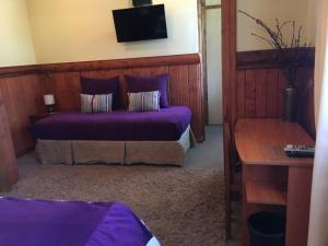 Ein Bett oder Betten in einem Zimmer der Unterkunft Merken Bed & Breakfast
