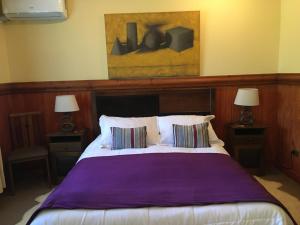 Ein Bett oder Betten in einem Zimmer der Unterkunft Merken Bed & Breakfast