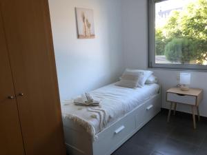 Posteľ alebo postele v izbe v ubytovaní Standing Apartment Barcelona Forum